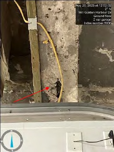 Honeycombing concrete on balcony slab — exposed rusting rebar