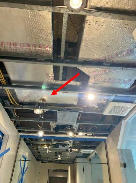 Hole drilled through HVAC air duct during light fixture installation